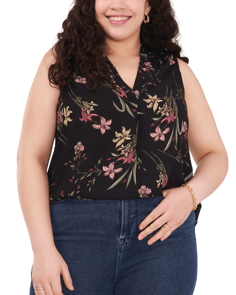 Front of a model wearing a size 1X Delilah Sleeveless Floral Blouse in RICH BLACK by Vince Camuto. | dia_product_style_image_id:261153